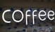 Неонова світлодіодна вивіска Coffee білого кольору 140х485 мм на прозорій основі.